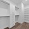 Penthouse Walk-In Closets with Built-In Shelving