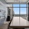 Skylounge with conference table, wall art, and views of Austin