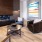 Well-lit lounge area with fireplace