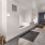 Large pet spa with bench seating and pup tub